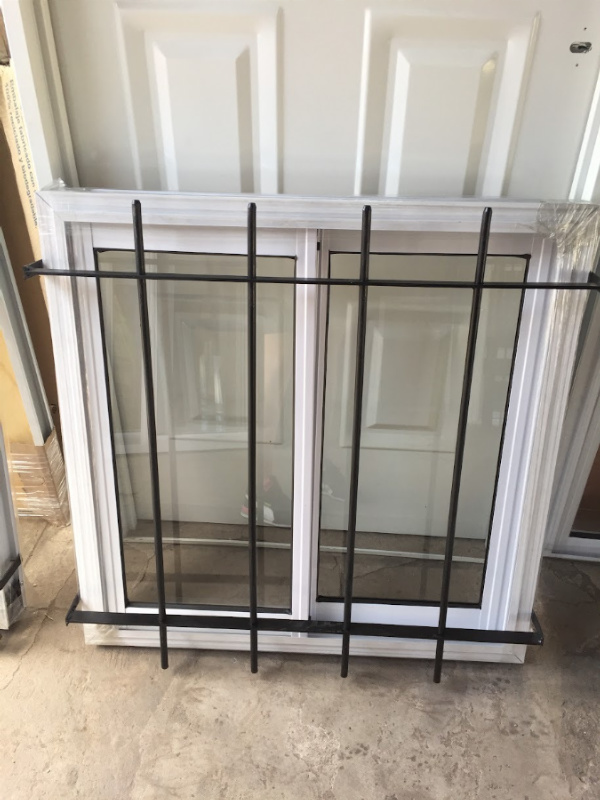VENTANA CON REJA HIERRO 12